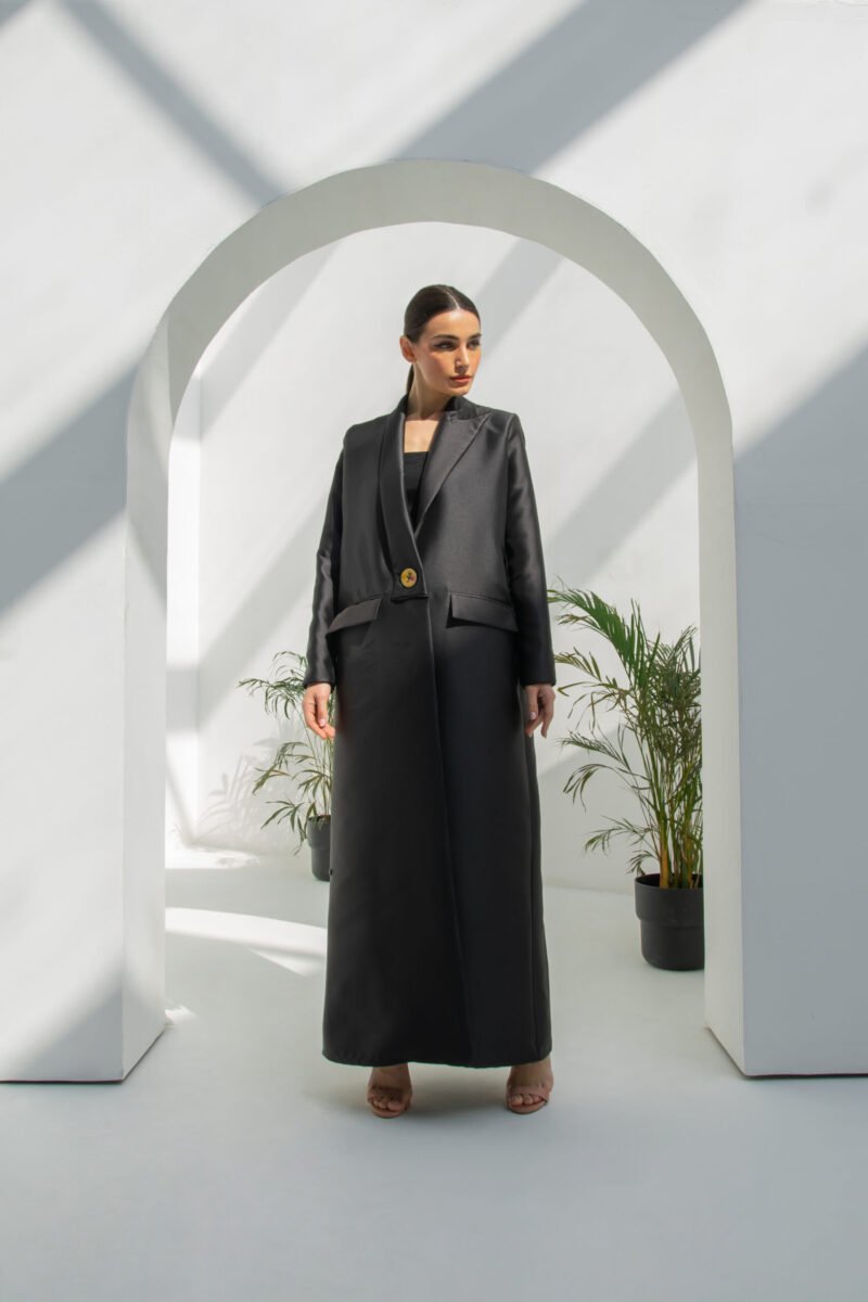 SS23 L-AS013 Mikado Abaya In An Un Symmetrical Modern Lapel Carring A Jumbo Handmade Pointed Button Black 1